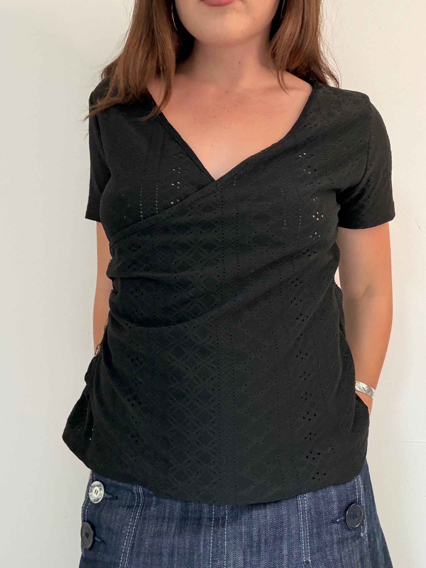 Black asymmetric button up short sleeve top