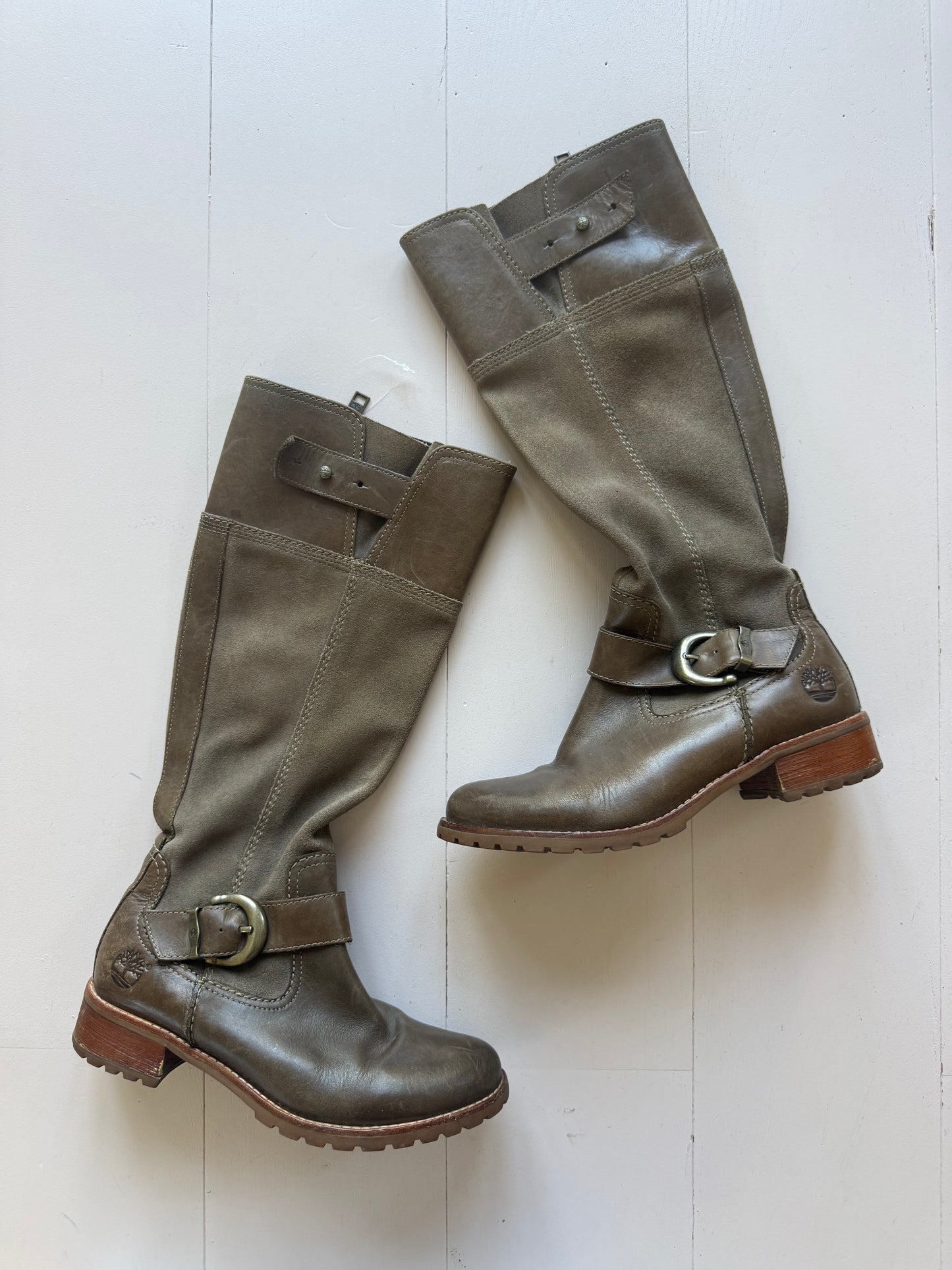 Timberlands brown chunky boots with brass buckle detail