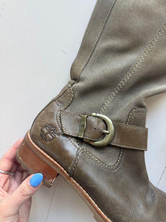 Timberlands brown chunky boots with brass buckle detail